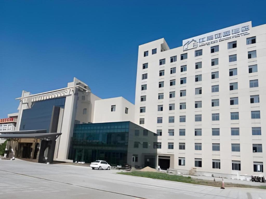 Zhangjiagang Jiangnan Garden Hotel Exterior photo