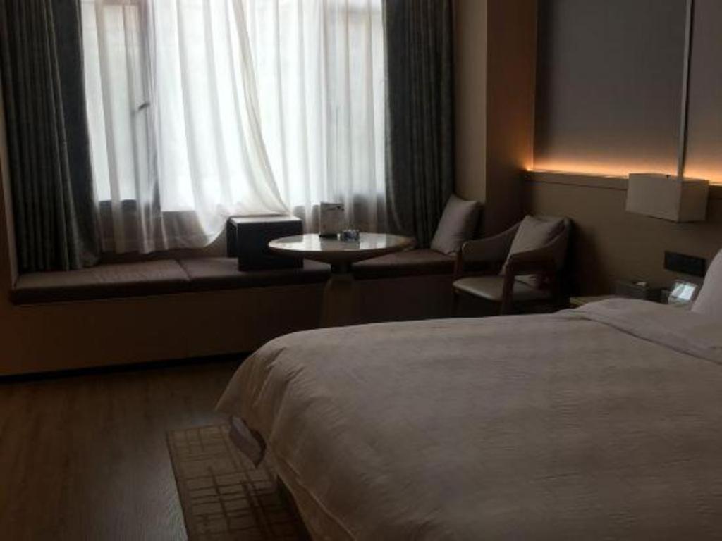 Zhangjiagang Jiangnan Garden Hotel Exterior photo